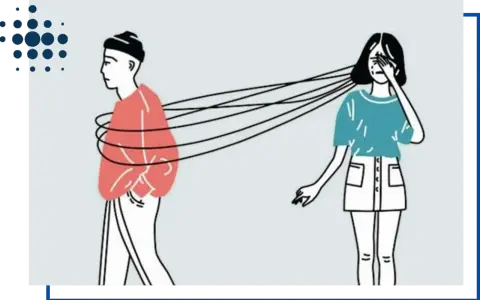 Una donna piange, legata a un uomo che si allontana. Le cause della dipendenza affettiva sono complesse.