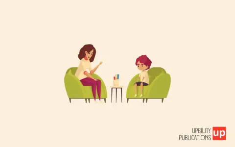 Una psicologa parla con un bambino di 6-7 anni seduti su poltrone verdi.
